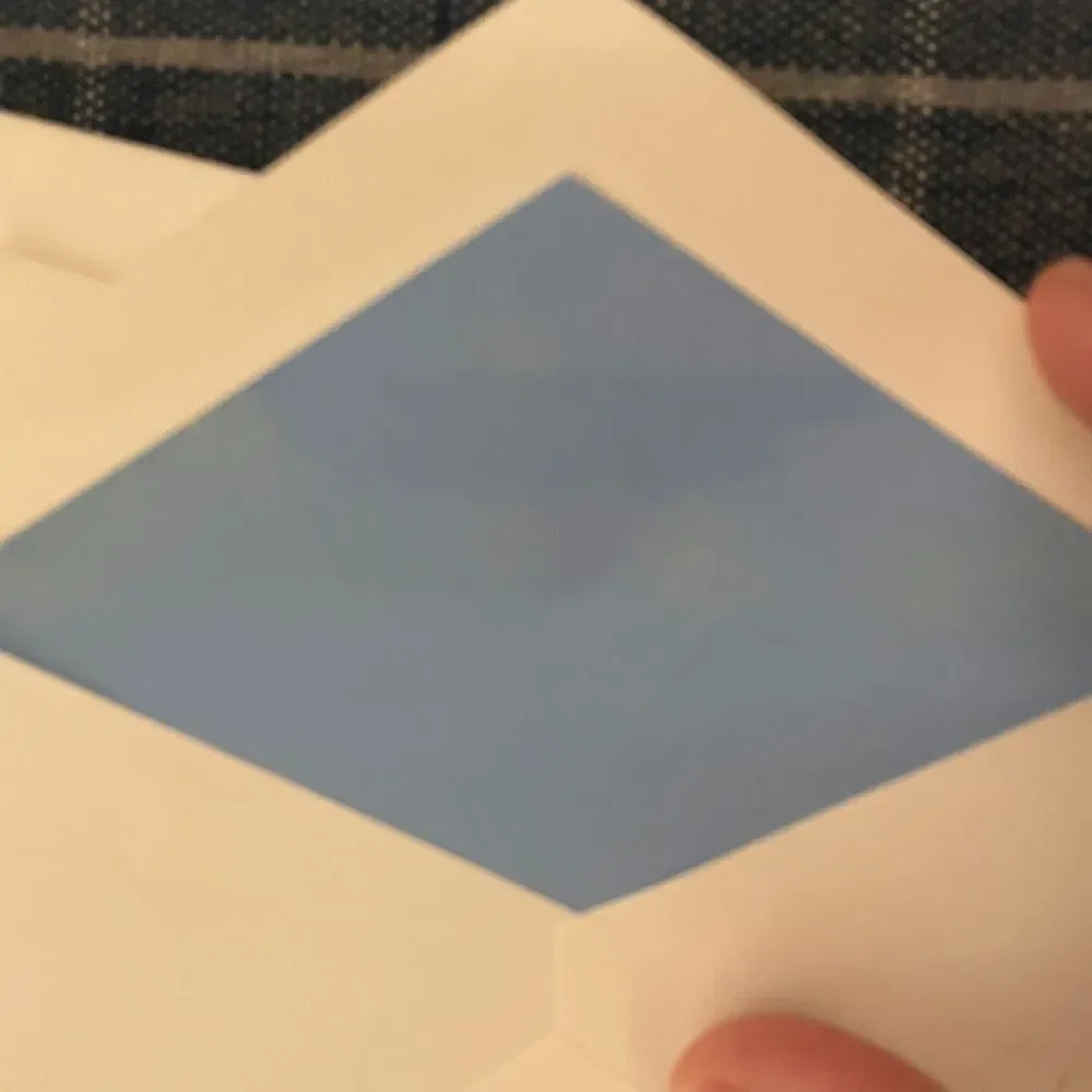 8 White and Blue Envelopes